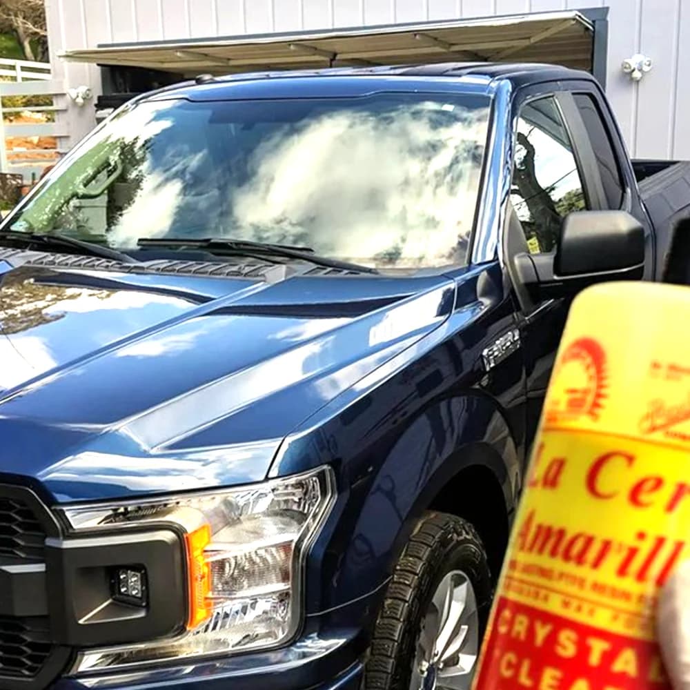 Navy blue Ford F-150 pickup with a fresh wax shine